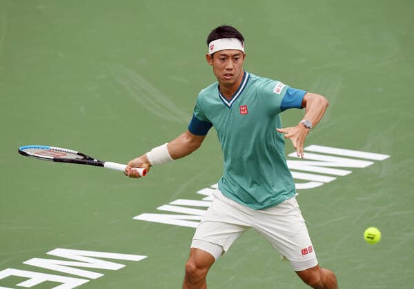 INDIAN WELLS, CA - OCTOBER 07: Kai Nishikori of Japan gets ready to hit the ball during a tennis match played on October 7, 2021 at the BNP Paribas Open played at the Indian Wells Tennis Garden in Indian Wells, CA. (Photo by John Cordes Icon Sportswire) TENNIS: OCT 07 BNP Paribas Open Icon506211007803