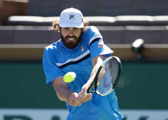 October 09, 2021 Reilly Opelka returns a shot to Taro Daniel of Japan during the 2021 BNP Paribas Open at Indian Wells Tennis Garden in Indian Wells, California. Mandatory Photo Credit : CSM Indian Wells United States of America - ZUMAc04_ 20211009_zaf_c04_085 Copyright: xCharlesxBausx