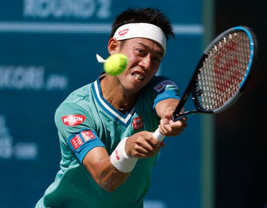 October 09, 2021 Kei Nishikori of Japan returns a shot against Dan Evans of Great Britain during the 2021 BNP Paribas Open at Indian Wells Tennis Garden in Indian Wells, California. Mandatory Photo Credit : CSM Indian Wells United States of America - ZUMAc04_ 20211009_zaf_c04_132 Copyright: xCharlesxBausx