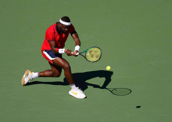 October 09, 2021 Francis Tiafoe returns a shot against Sebastian Korda during the 2021 BNP Paribas Open at Indian Wells Tennis Garden in Indian Wells, California. Mandatory Photo Credit : CSM Indian Wells United States of America - ZUMAc04_ 20211009_zaf_c04_363 Copyright: xCharlesxBausx