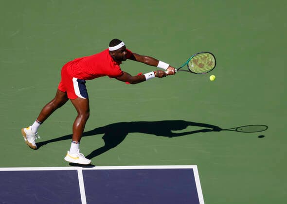October 09, 2021 Francis Tiafoe returns a shot against Sebastian Korda during the 2021 BNP Paribas Open at Indian Wells Tennis Garden in Indian Wells, California. Mandatory Photo Credit : CSM Indian Wells United States of America - ZUMAc04_ 20211009_zaf_c04_370 Copyright: xCharlesxBausx