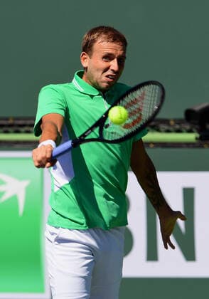INDIAN WELLS, CA - OCTOBER 09: Daniel Evans of Great Britain returns the ball in a tennis match during the BNP Paribas Open played on October 9, 2021 at the Indian Wells Tennis Garden in Indian Wells, CA. (Photo by John Cordes Icon Sportswire) TENNIS: OCT 09 BNP Paribas Open Icon506211009043