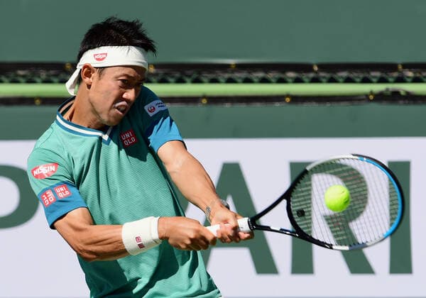 INDIAN WELLS, CA - OCTOBER 09: Kei Nishikori of Japan hits a backhand shot during a tennis match during the BNP Paribas Open played on October 9, 2021 at the Indian Wells Tennis Garden in Indian Wells, CA. (Photo by John Cordes Icon Sportswire) TENNIS: OCT 09 BNP Paribas Open Icon506211009046