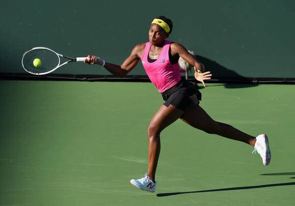 INDIAN WELLS, CA - OCTOBER 09: Cori Gauff of the United States chases after and returns the ball during a tennis match during the BNP Paribas Open played on October 9, 2021 at the Indian Wells Tennis Garden in Indian Wells, CA. (Photo by John Cordes Icon Sportswire) TENNIS: OCT 09 BNP Paribas Open Icon506211009070