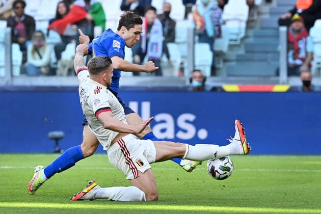 Italian Federico Chiesa and Belgium s Toby Alderweireld fight for the ball during a soccer game between Belgian national team, Nationalteam Red Devils and Italy, the Nations League third-place play-off, in Torino, Italy, on Sunday 10 October 2021. DIRKxWAEM  x3110888x