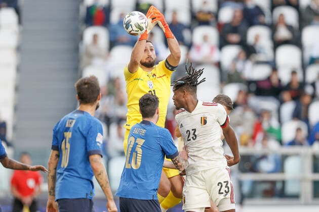Italian Gianluigi Donnarumma and Belgium s Michy Batshuayi fight for the ball during a soccer game between Belgian national team, Nationalteam Red Devils and Italy, the Nations League third-place play-off, in Torino, Italy, on Sunday 10 October 2021. BRUNOxFAHY  x3111090x