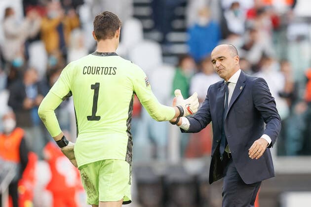 Belgium s goalkeeper Thibaut Courtois and Belgium s head coach Roberto Martinez pictured after a soccer game between Belgian national team, Nationalteam Red Devils and Italy, the Nations League third-place play-off, in Torino, Italy, on Sunday 10 October 2021. BRUNOxFAHY  x3111200x