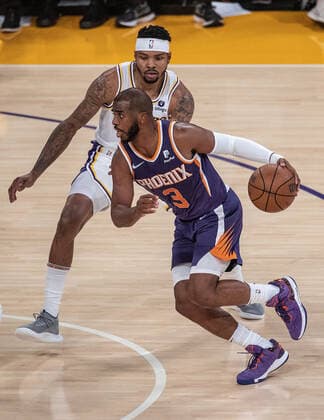 October 10, 2021, Los Angeles, California, USA: Chris Paul 3 of the Phoenix Suns drives to the basket during their pre-season NBA, Basketball Herren, USA game with the Phoenix Suns on Sunday October 10, 2021 at the Staples Center in Los Angeles, California. PI Los Angeles USA - ZUMAp124 20211010_zaa_p124_008 Copyright: xJAVIERxROJASx