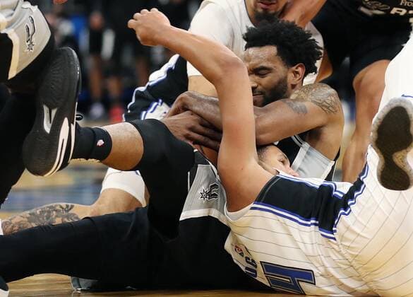October 10, 2021, Orlando, FL, USA: Orlando Magic guard Jalen Suggs (bottom) loses the ball in a scrum on the last play of the game against the San Antonio Spurs during a preseason game at the Amway Center on Sunday, Oct. 10, 2021 in Orlando, Florida. San Antonio won the game 101-100. Orlando USA - ZUMAm67_ 0138145757st Copyright: xStephenxM.xDowellx