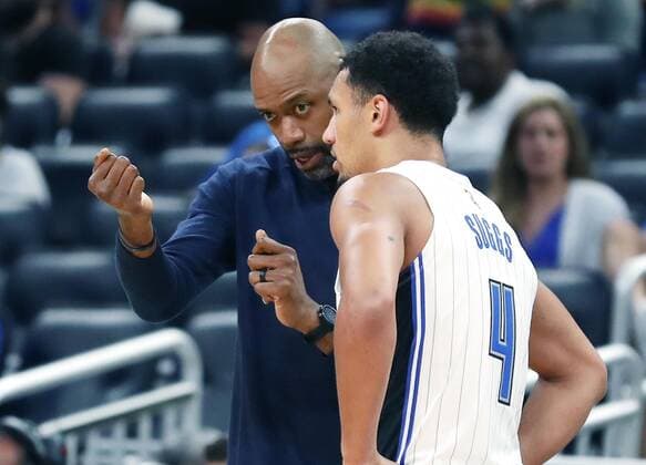 October 10, 2021, Orlando, FL, USA: Orlando Magic coach Jamahl Mosley coaches guard Jalen Suggs against the San Antonio Spurs during a preseason game at the Amway Center on Sunday, Oct. 10, 2021 in Orlando, Florida. San Antonio won the game 101-100. Orlando USA - ZUMAm67_ 0138145965st Copyright: xStephenxM.xDowellx