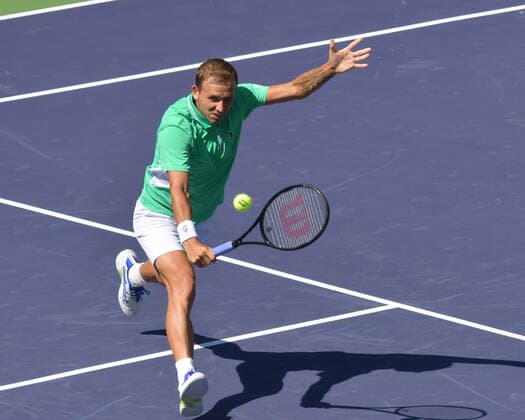 INDIAN WELLS, CA - OCTOBER 11: Daniel Evans (GBR) hits a backhand volley during his men s singles match at the BNP Paribas Open on October 11, 2021, at the Indian Wells Tennis Garden in Indian Wells, CA. ) (Photo by Cynthia Lum Icon Sportswire TENNIS: OCT 11 BNP Paribas Open Icon250211011654