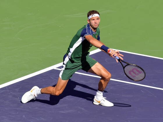 INDIAN WELLS, CA - OCTOBER 11: Grigor Dimitrov (BUL) running for a short forehand during his men s singles match at the BNP Paribas Open on October 11, 2021, at the Indian Wells Tennis Garden in Indian Wells, CA. (Photo by Cynthia Lum Icon Sportswire) TENNIS: OCT 11 BNP Paribas Open Icon250211010682