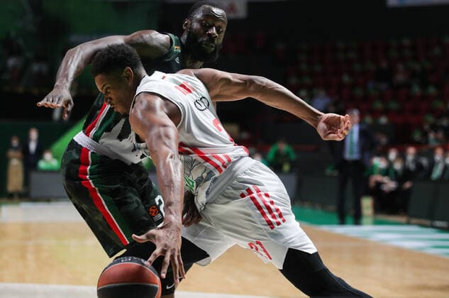 KAZAN, RUSSIA â€“ OCTOBER 12, 2021: Bayern Munich s Augustine Rubit (front) and UNICS Kazan s Tonye Jekiri in a 2021-22 Euroleague Regular Season Round 3 basketball match between UNICS Kazan and Bayern Munich at Kazan Basket Hall. Yegor Aleyev TASS  TS113EE0