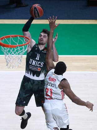 KAZAN, RUSSIA â€“ OCTOBER 12, 2021: UNICS Kazan s Mario Hezonja (L) and Bayern Munich s Augustine Rubit in a 2021-22 Euroleague Regular Season Round 3 basketball match between UNICS Kazan and Bayern Munich at Kazan Basket Hall. Yegor Aleyev TASS  TS113F25