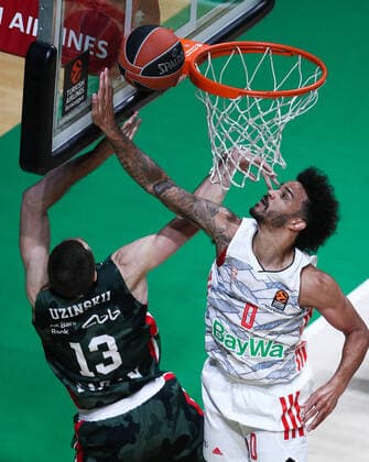 KAZAN, RUSSIA â€“ OCTOBER 12, 2021: UNICS Kazan s Dmitry Uzinsky (L) and Bayern Munich s Nick Weiler-Babb in a 2021-22 Euroleague Regular Season Round 3 basketball match between UNICS Kazan and Bayern Munich at Kazan Basket Hall. UNICS Kazan won 73-70. Yegor Aleyev TASS  TS113F2B