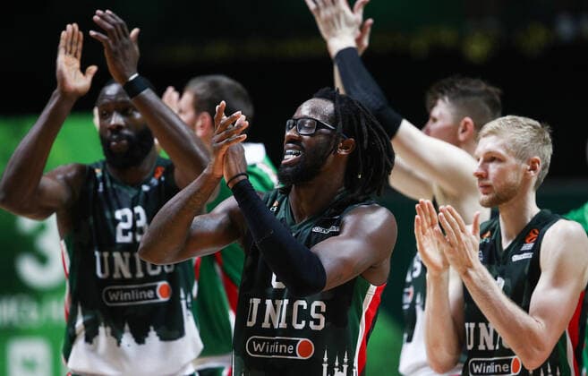 KAZAN, RUSSIA â€“ OCTOBER 12, 2021: UNICS Kazan s Tonye Jekiri, John Brown and Vyacheslav Zaitsev (L-R front) celebrate victory in a 2021-22 Euroleague Regular Season Round 3 basketball match between UNICS Kazan and Bayern Munich at Kazan Basket Hall. UNICS Kazan won 73-70. Yegor Aleyev TASS  TS113F44