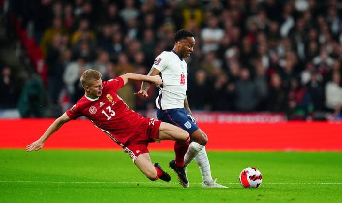 Mandatory Credit: Photo by Javier Garcia Shutterstock (12534018e) Andras Schafer of Hungary battles with Raheem Sterling of England England v Hungary, FIFA World Cup, WM, Weltmeisterschaft, Fussball 2022 Qualifying, Group I, Football, Wembley Stadium, London, UK - 12 Oct 2021 EDITORIAL USE ONLY No use with unauthorised audio, video, data, fixture lists, club league logos or live services. Online in-match use limited to 120 images, no video emulation. No use in betting, games or single club league player publications. England v Hungary, FIFA World Cup 2022 Qualifying, Group I, Football, Wembley Stadium, London, UK - 12 Oct 2021 EDITORIAL USE ONLY No use with unauthorised audio, video, data, fixture lists, club league logos or live services. Online in-match use limited to 120 images, no video emulation. No use in betting, games or single club league player publications. Copyright: xJavierxGarcia Shutterstockx 12534018e