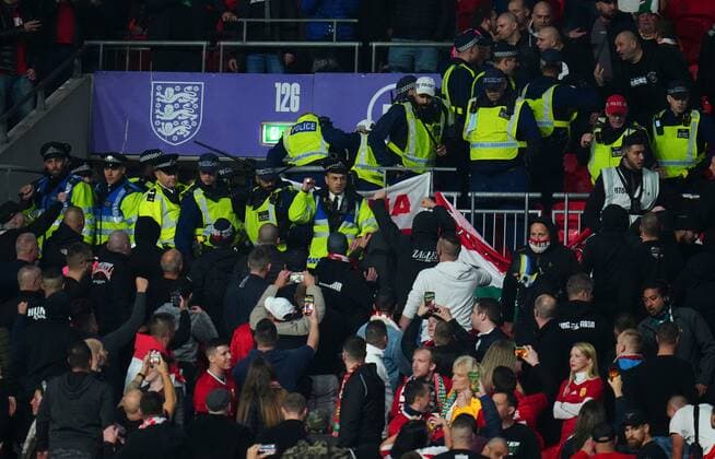 Mandatory Credit: Photo by Javier Garcia Shutterstock (12534018n) Hungary fans clash with police England v Hungary, FIFA World Cup, WM, Weltmeisterschaft, Fussball 2022 Qualifying, Group I, Football, Wembley Stadium, London, UK - 12 Oct 2021 EDITORIAL USE ONLY No use with unauthorised audio, video, data, fixture lists, club league logos or live services. Online in-match use limited to 120 images, no video emulation. No use in betting, games or single club league player publications. England v Hungary, FIFA World Cup 2022 Qualifying, Group I, Football, Wembley Stadium, London, UK - 12 Oct 2021 EDITORIAL USE ONLY No use with unauthorised audio, video, data, fixture lists, club league logos or live services. Online in-match use limited to 120 images, no video emulation. No use in betting, games or single club league player publications. Copyright: xJavierxGarcia Shutterstockx 12534018n