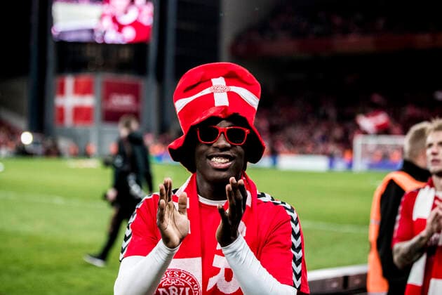 Denmark v Austria, World Cup qualifier, Copenhagen, Denmark Copenhagen, Denmark. 12th, October 2021. Denmark have qualified for the World Cup 2022 in Qatar after a 1-0 win in the UEFA World Cup qualifier between Denmark and Austria at Parken in Copenhagen. Here Mohamed Daramy is celebrating the victory and qualification with the fans. Copenhagen Denmark  Copyright: xGonzalesxPhoto LassexLagonix