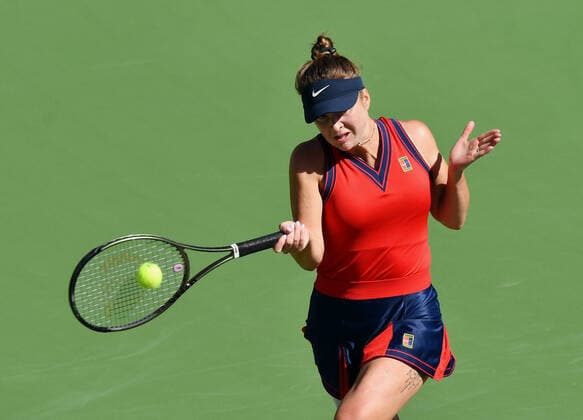 INDIAN WELLS, CA - OCTOBER 12: Elina Svitolina of the Ukraine returns the ball during a tennis match played at the BNP Paribas Open on October 12, 2021 at the Indian Wells Tennis Garden in Indian Wells, CA. (Photo by John Cordes Icon Sportswire) TENNIS: OCT 12 BNP Paribas Open Icon506211012107