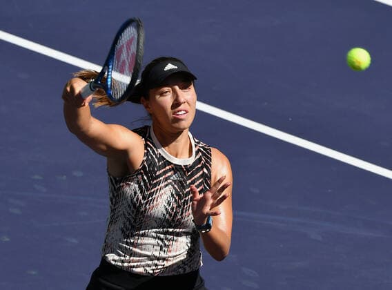 INDIAN WELLS, CA - OCTOBER 12: Jessica Pegula of the United States hits an overhand return during a tennis match played at the BNP Paribas Open on October 12, 2021 at the Indian Wells Tennis Garden in Indian Wells, CA. (Photo by John Cordes Icon Sportswire) TENNIS: OCT 12 BNP Paribas Open Icon506211012116