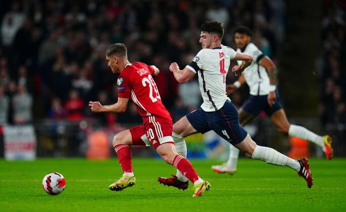 Mandatory Credit: Photo by Javier Garcia Shutterstock (12534018ej) Declan Rice of England chases Roland Sallai of Hungary England v Hungary, FIFA World Cup, WM, Weltmeisterschaft, Fussball 2022 Qualifying, Group I, Football, Wembley Stadium, London, UK - 12 Oct 2021 EDITORIAL USE ONLY No use with unauthorised audio, video, data, fixture lists, club league logos or live services. Online in-match use limited to 120 images, no video emulation. No use in betting, games or single club league player publications. England v Hungary, FIFA World Cup 2022 Qualifying, Group I, Football, Wembley Stadium, London, UK - 12 Oct 2021 EDITORIAL USE ONLY No use with unauthorised audio, video, data, fixture lists, club league logos or live services. Online in-match use limited to 120 images, no video emulation. No use in betting, games or single club league player publications. Copyright: xJavierxGarcia Shutterstockx 12534018ej