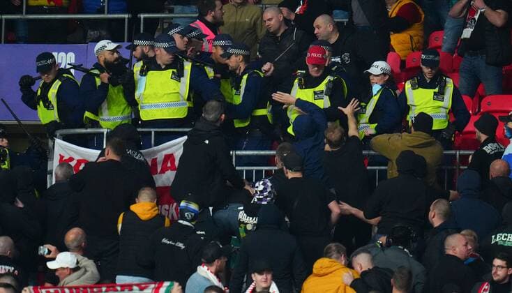 Mandatory Credit: Photo by Javier Garcia Shutterstock (12534018fd) Hungary fans clash with police England v Hungary, FIFA World Cup, WM, Weltmeisterschaft, Fussball 2022 Qualifying, Group I, Football, Wembley Stadium, London, UK - 12 Oct 2021 EDITORIAL USE ONLY No use with unauthorised audio, video, data, fixture lists, club league logos or live services. Online in-match use limited to 120 images, no video emulation. No use in betting, games or single club league player publications. England v Hungary, FIFA World Cup 2022 Qualifying, Group I, Football, Wembley Stadium, London, UK - 12 Oct 2021 EDITORIAL USE ONLY No use with unauthorised audio, video, data, fixture lists, club league logos or live services. Online in-match use limited to 120 images, no video emulation. No use in betting, games or single club league player publications.  Copyright: xJavierxGarcia Shutterstockx 12534018fd