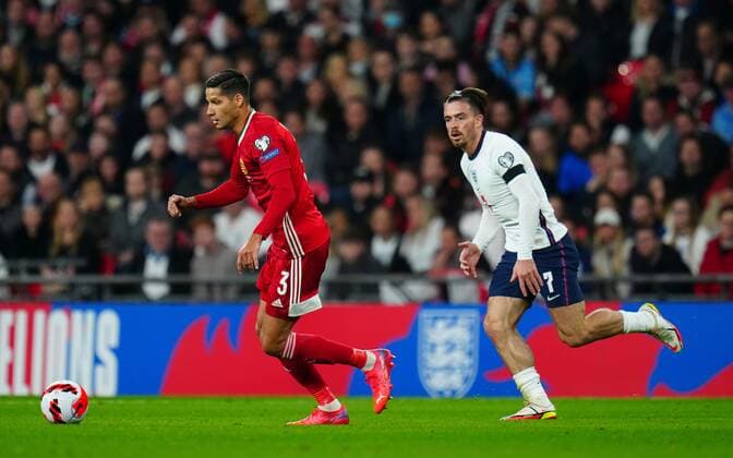 Mandatory Credit: Photo by Javier Garcia Shutterstock (12534018ev) Jack Grealish of England chases Akos Kecskes of Hungary England v Hungary, FIFA World Cup, WM, Weltmeisterschaft, Fussball 2022 Qualifying, Group I, Football, Wembley Stadium, London, UK - 12 Oct 2021 EDITORIAL USE ONLY No use with unauthorised audio, video, data, fixture lists, club league logos or live services. Online in-match use limited to 120 images, no video emulation. No use in betting, games or single club league player publications. England v Hungary, FIFA World Cup 2022 Qualifying, Group I, Football, Wembley Stadium, London, UK - 12 Oct 2021 EDITORIAL USE ONLY No use with unauthorised audio, video, data, fixture lists, club league logos or live services. Online in-match use limited to 120 images, no video emulation. No use in betting, games or single club league player publications. Copyright: xJavierxGarcia Shutterstockx 12534018ev