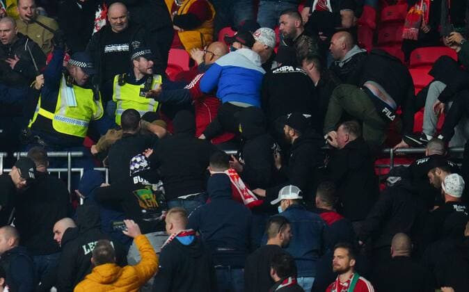 Mandatory Credit: Photo by Javier Garcia Shutterstock (12534018ew) Hungary fans clash with police England v Hungary, FIFA World Cup, WM, Weltmeisterschaft, Fussball 2022 Qualifying, Group I, Football, Wembley Stadium, London, UK - 12 Oct 2021 EDITORIAL USE ONLY No use with unauthorised audio, video, data, fixture lists, club league logos or live services. Online in-match use limited to 120 images, no video emulation. No use in betting, games or single club league player publications. England v Hungary, FIFA World Cup 2022 Qualifying, Group I, Football, Wembley Stadium, London, UK - 12 Oct 2021 EDITORIAL USE ONLY No use with unauthorised audio, video, data, fixture lists, club league logos or live services. Online in-match use limited to 120 images, no video emulation. No use in betting, games or single club league player publications.  Copyright: xJavierxGarcia Shutterstockx 12534018ew