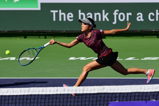 INDIAN WELLS, CA - OCTOBER 12: Makoto Ninomiya of Japan returns a shot during a doubles tennis match played at the BNP Paribas Open on October 12, 2021 at the Indian Wells Tennis Garden in Indian Wells, CA. (Photo by John Cordes Icon Sportswire) TENNIS: OCT 12 BNP Paribas Open Icon506211012418