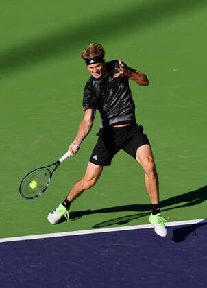 INDIAN WELLS, CA - OCTOBER 12: Alexander Zverev of Germany hits a forehand shot during a tennis match played at the BNP Paribas Open on October 12, 2021 at the Indian Wells Tennis Garden in Indian Wells, CA. (Photo by John Cordes Icon Sportswire) TENNIS: OCT 12 BNP Paribas Open Icon506211012502