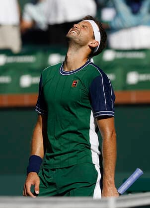 October 14, 2021 Grigor Dimitrov of Bulgaria celebrates after defeating Hubert Hurkacz of Poland during their quarterfinal match of the 2021 BNP Paribas Open at Indian Wells Tennis Garden in Indian Wells, California. Mandatory Photo Credit : CSM Indian Wells United States of America - ZUMAc04_ 20211014_zaf_c04_015 Copyright: xCharlesxBausx