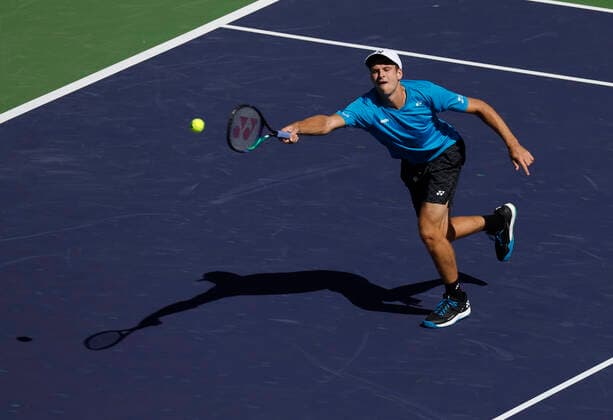 October 14, 2021 Hubert Hurkacz of Poland returns a shot against Grigor Dimitrov of Bulgaria during their quarterfinal match of the 2021 BNP Paribas Open at Indian Wells Tennis Garden in Indian Wells, California. Mandatory Photo Credit : CSM Indian Wells United States of America - ZUMAc04_ 20211014_zaf_c04_029 Copyright: xCharlesxBausx