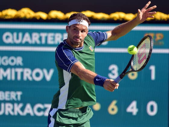 INDIAN WELLS, CA - OCTOBER 14: Gregor Dimitrov (BUL)hits a backhand during his quarter final match during the BNP Paribas Open on October 14, 2021, at the Indian Wells Tennis Garden in Indian Wells, CA. (Photo by Cynthia Lum Icon Sportswire) TENNIS: OCT 14 BNP Paribas Open Icon250211014084