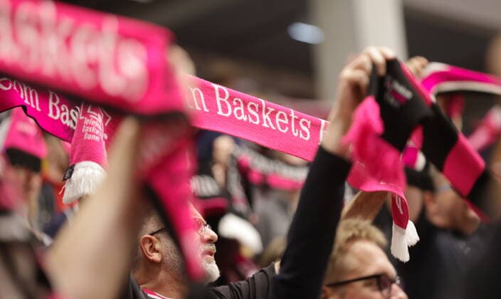 Fans with scarves at the game Telekom Baskets Bonn vs Fraport Skyliners Frankfurt easyCredit BBL 1 Bundesliga , season 2021 2022 , main round 4 matchday