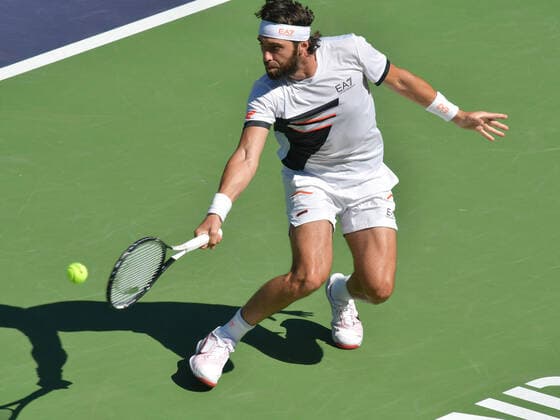 INDIAN WELLS, CA - OCTOBER 15: Nikoloz Basilashvili (GEO) hits a half volley during his quarterfinal match at the BNP Paribas Open on October 15, 2021, at the Indian Wells Tennis Garden in Indian Wells, CA. (Photo by Cynthia Lum Icon Sportswire) TENNIS: OCT 15 BNP Paribas Open Icon2502110151247