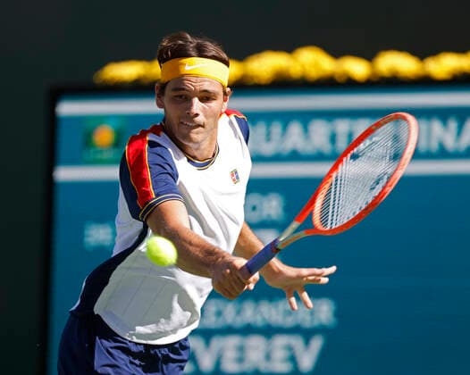 October 15, 2021 Taylor Fritz returns a shot against Alexander Zverev of Germany during the 2021 BNP Paribas Open at Indian Wells Tennis Garden in Indian Wells, California. Mandatory Photo Credit : CSM Indian Wells United States of America - ZUMAc04_ 20211015_zaf_c04_052 Copyright: xCharlesxBausx