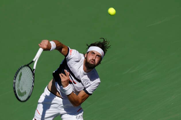 October 15, 2021 Nikoloz Basilashvili of Georgia serves against Stefanos Tsitsipas of Greece during their quarterfinal match of the 2021 BNP Paribas Open at Indian Wells Tennis Garden in Indian Wells, California. Mandatory Photo Credit : CSM Indian Wells United States of America - ZUMAc04_ 20211015_zaf_c04_077 Copyright: xCharlesxBausx