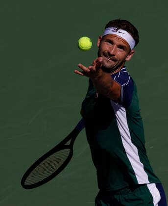October 16, 2021 Grigor Dimitrov of Bulgaria serves against Cameron Norrie of Great Britain in their semifinal match during the 2021 BNP Paribas Open at Indian Wells Tennis Garden in Indian Wells, California. Mandatory Photo Credit : CSM Indian Wells United States of America - ZUMAc04_ 20211016_zaf_c04_186 Copyright: xCharlesxBausx