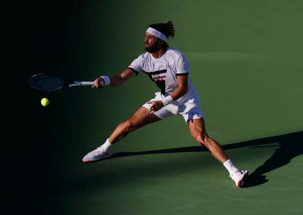 October 16, 2021 Nikoloz Basilashvili of Georgia returns a shot to Taylor Fritz during the semifinals of the 2021 BNP Paribas Open at Indian Wells Tennis Garden in Indian Wells, California. Mandatory Photo Credit : CSM Indian Wells United States of America - ZUMAc04_ 20211016_zaf_c04_324 Copyright: xCharlesxBausx