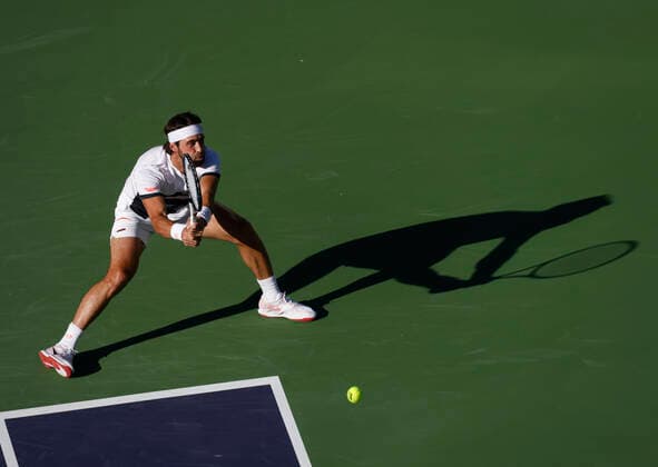 October 16, 2021 Nikoloz Basilashvili of Georgia returns a shot to Taylor Fritz during the semifinals of the 2021 BNP Paribas Open at Indian Wells Tennis Garden in Indian Wells, California. Mandatory Photo Credit : CSM Indian Wells United States of America - ZUMAc04_ 20211016_zaf_c04_320 Copyright: xCharlesxBausx