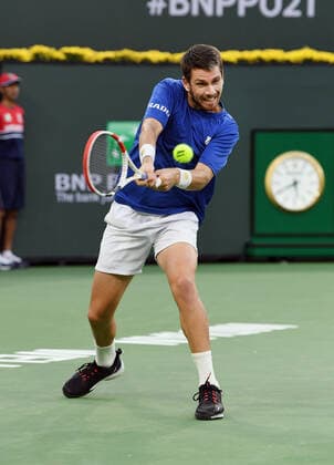 INDIAN WELLS, CA - OCTOBER 17: Cameron Norrie of Great Britain returns the ball during a finals tennis match at the BNP Paribas Open played on October 17, 2021 at the Indian Wells Tennis Garden in Indian Wells, CA. (Photo by John Cordes Icon Sportswire) TENNIS: OCT 17 BNP Paribas Open Icon506211017904