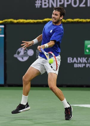 INDIAN WELLS, CA - OCTOBER 17: Cameron Norrie of Great Britain returns the ball during a finals tennis match at the BNP Paribas Open played on October 17, 2021 at the Indian Wells Tennis Garden in Indian Wells, CA. (Photo by John Cordes Icon Sportswire) TENNIS: OCT 17 BNP Paribas Open Icon506211017910