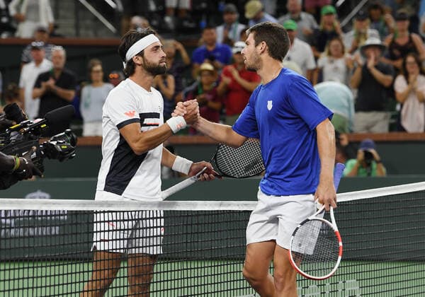 INDIAN WELLS, CA - OCTOBER 17: Nikoloz Basilashvili of Georgia shakes hands with Cameron Norrie of Great Britain after Norrie defeated Basilashvili to become the 2021 BNP Paribas Open Champion in a finals tennis match played on October 17, 2021 at the Indian Wells Tennis Garden in Indian Wells, CA. (Photo by John Cordes Icon Sportswire) TENNIS: OCT 17 BNP Paribas Open Icon506211017917