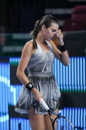 MOSCOW, RUSSIA - OCTOBER 18, 2021: Australia s Ajla Tomljanovic struggles in her VTB Kremlin Cup 2021 tennis match against Russia s Lyudmila Samsonova at the Krylatskoye Ice Palace. Mikhail Tereshchenko TASS  TS11486C