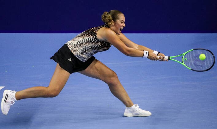 MOSCOW, RUSSIA - OCTOBER 19, 2021: Latvia s Jelena Ostapenko in action in her womenâ€™s singles Round of 32 tennis match against Germany s Andrea Petkovic at the VTB Kremlin Cup 2021 at the Luzhniki Palace of Sports. Mikhail Tereshchenko TASS  TS114CAF
