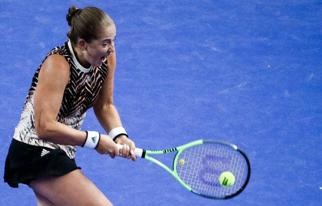 MOSCOW, RUSSIA - OCTOBER 19, 2021: Latvia s Jelena Ostapenko in action in her womenâ€™s singles Round of 32 tennis match against Germany s Andrea Petkovic at the VTB Kremlin Cup 2021 at the Luzhniki Palace of Sports. Mikhail Tereshchenko TASS  TS114CD9