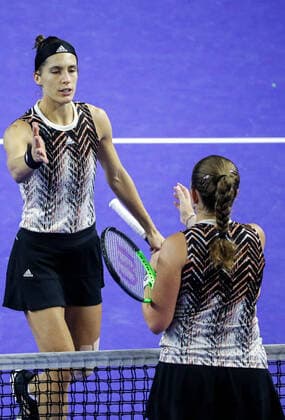 MOSCOW, RUSSIA - OCTOBER 19, 2021: Germany s Andrea Petkovic (L) and Latvia s Jelena Ostapenko shake hands after their singles Round of 32 tennis match at the VTB Kremlin Cup 2021 at the Luzhniki Palace of Sports. Mikhail Tereshchenko TASS  TS114CF0
