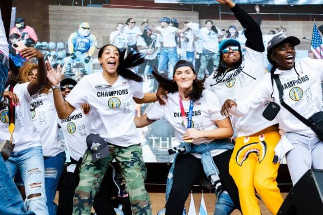 The Loop Chicago Sky players dance on stage during the Chicago Sky Championship Parade and Rally on October 19, 2021 at the Pritzker Pavilion Shaina Benhiyoun SPP Chicago Sky 2021 Championship Parade and Rally 