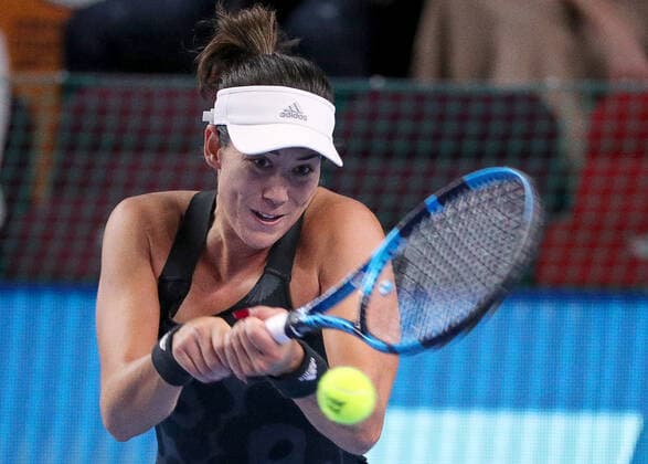 MOSCOW, RUSSIA - OCTOBER 20, 2021: Spain s Garbine Muguruza returns the ball in her women s singles Round of 16 tennis match against the Czech Republic s Tereza Martincova at the VTB Kremlin Cup 2021 at the Luzhniki Sports Palace. Mikhail Tereshchenko TASS  TS114D66